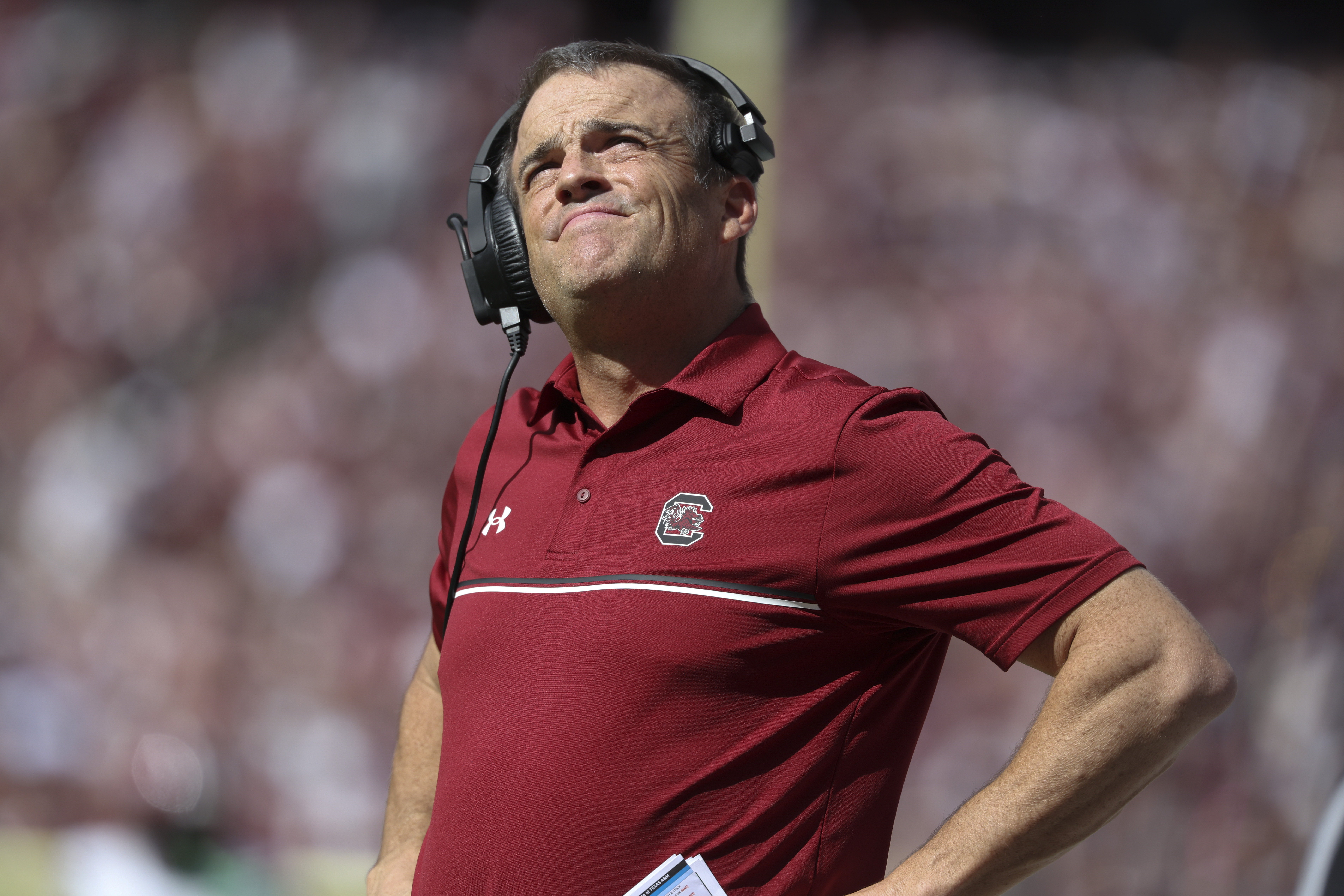 Nov 15, 2025; College Station, Texas, USA; South Carolina Gamecocks head coach Shane Beamer looks up during the second quarter against the Texas A&M Aggies at Kyle Field. Mandatory Credit: Troy Taormina-Imagn Images