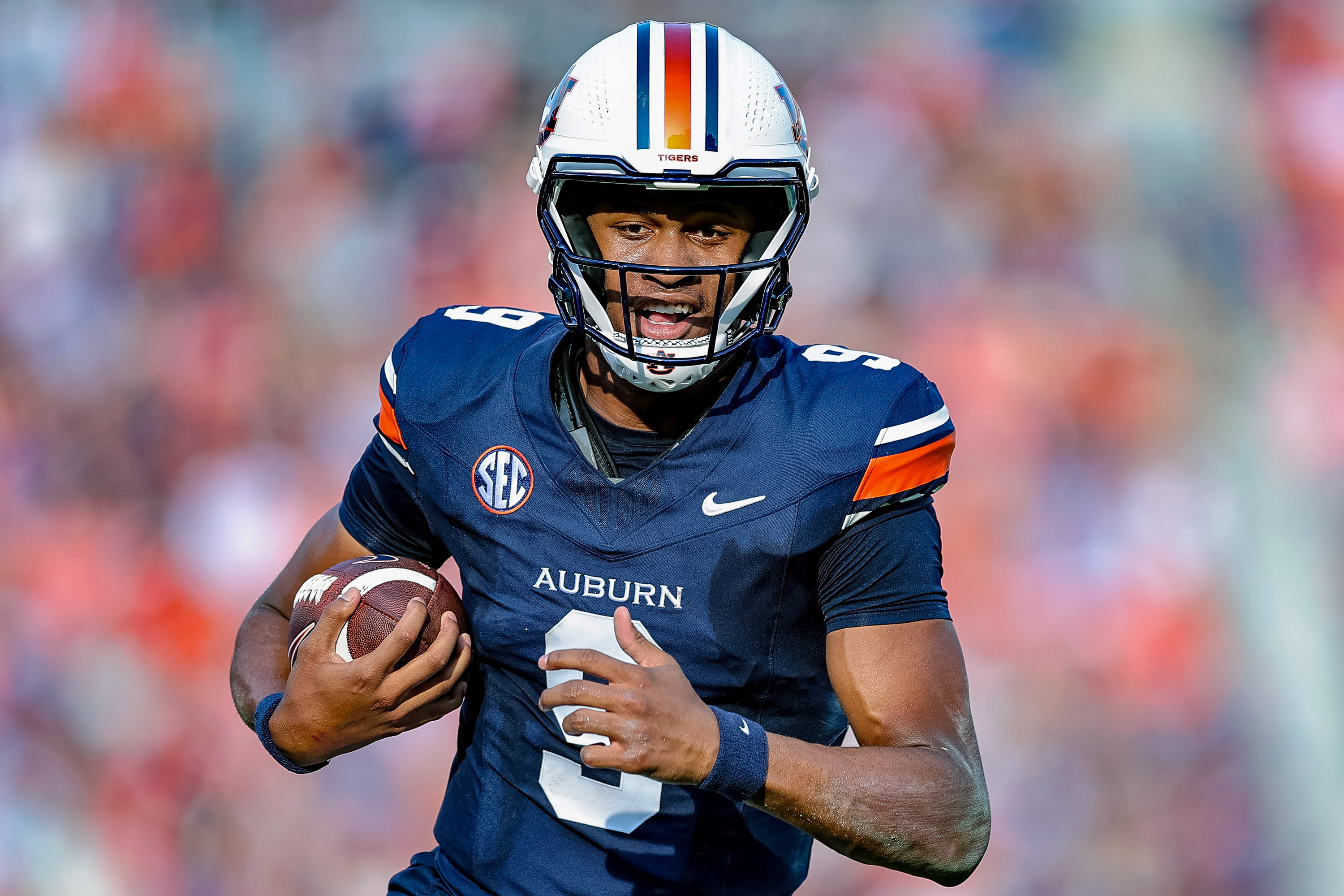 AUBURN, ALABAMA - NOVEMBER 22: Deuce Knight #9 of the Auburn Tigers runs the ball during the first half against the Mercer Bears at Jordan Hare Stadium on November 22, 2025 in Auburn, Alabama. (Photo by Brandon Sumrall/Getty Images)