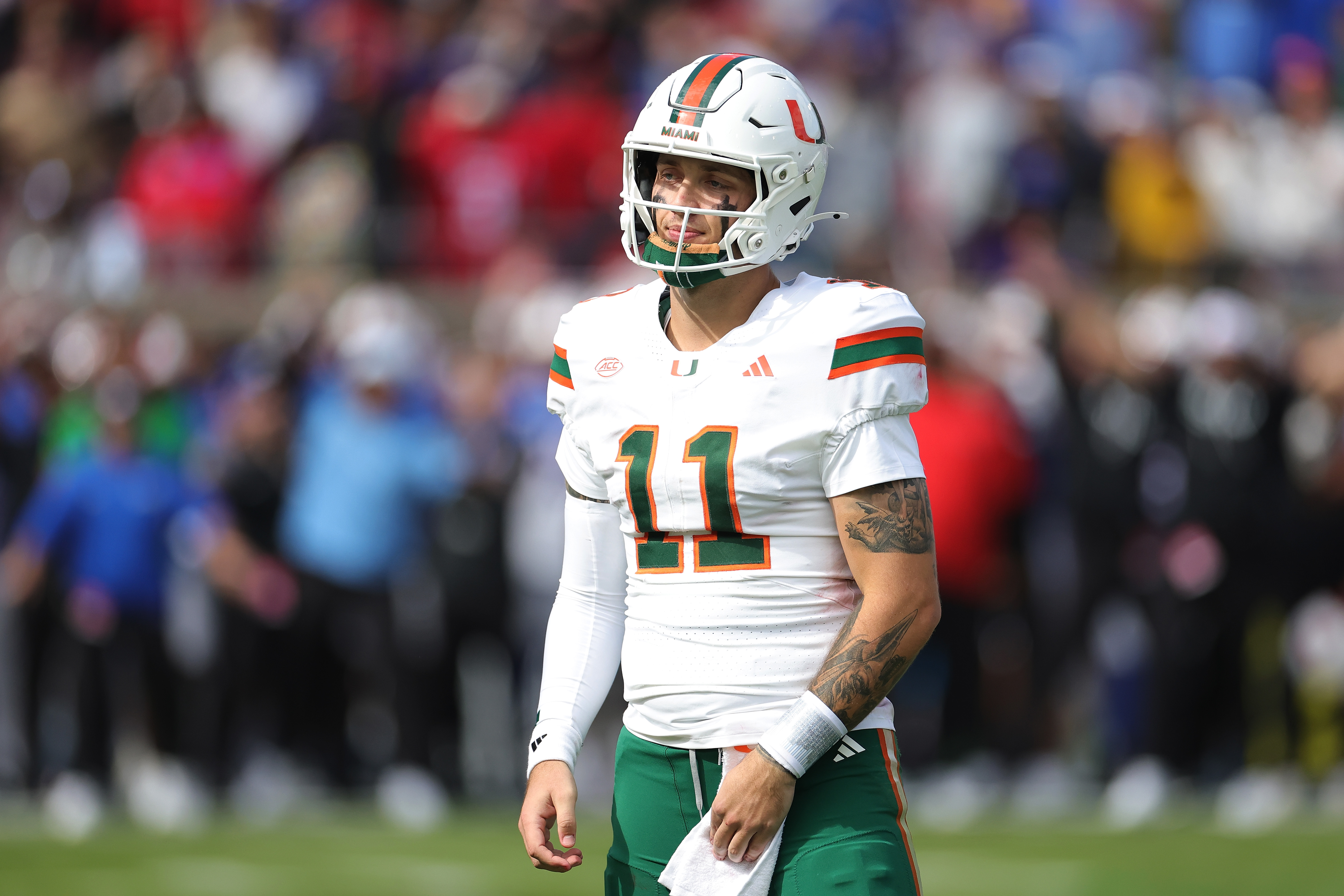 DALLAS, TEXAS - NOVEMBER 01: Carson Beck #11 of the Miami Hurricanes reacts to an incomplete pass against the Southern Methodist Mustangs during the second quarter at Gerald J. Ford Stadium on November 01, 2025 in Dallas, Texas. (Photo by Stacy Revere/Getty Images)