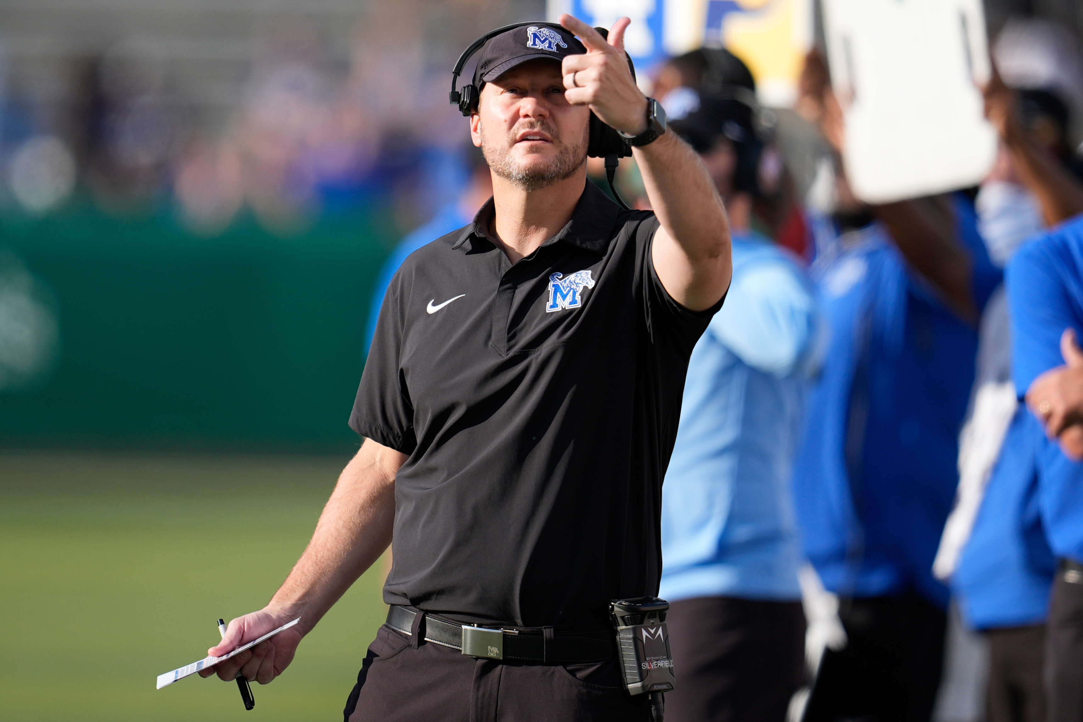 Memphis head coach Ryan Silverfield walks the sidelines during the first half of an NCAA college football game against UAB, Saturday, Oct. 18, 2025, in Birmingham, Ala. (AP Photo/Mike Stewart)
