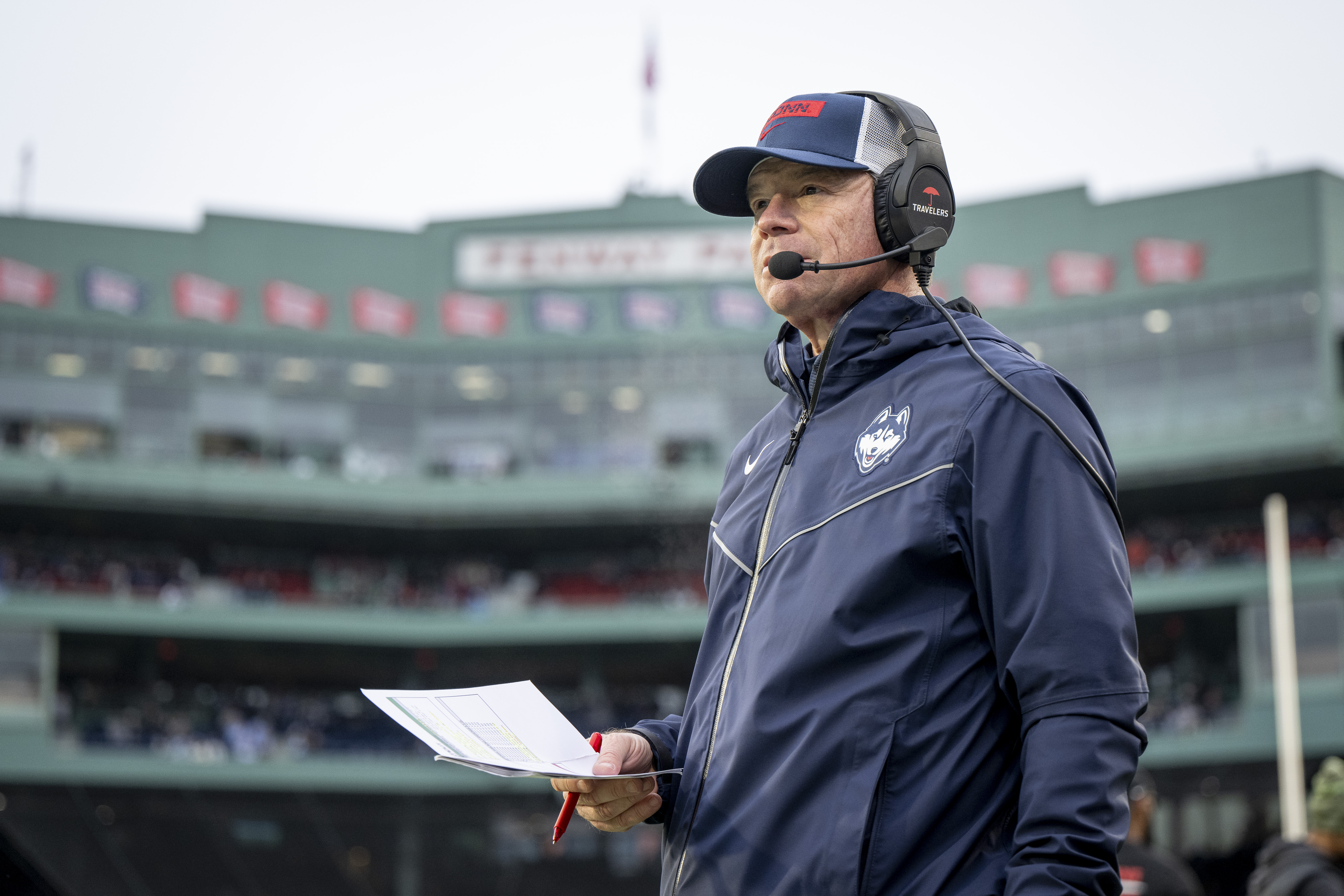 BOSTON, MASSACHUSETTS - DECEMBER 28: Head Coach Jim Mora of the Connecticut Huskies looks on during the fourth quarter of the 2024 Wasabi Fenway Bowl game against the North Carolina Tar Heels on December 28, 2024 at Fenway Park in Boston, Massachusetts. (Photo by Maddie Malhotra/Boston Red Sox/Getty Images)