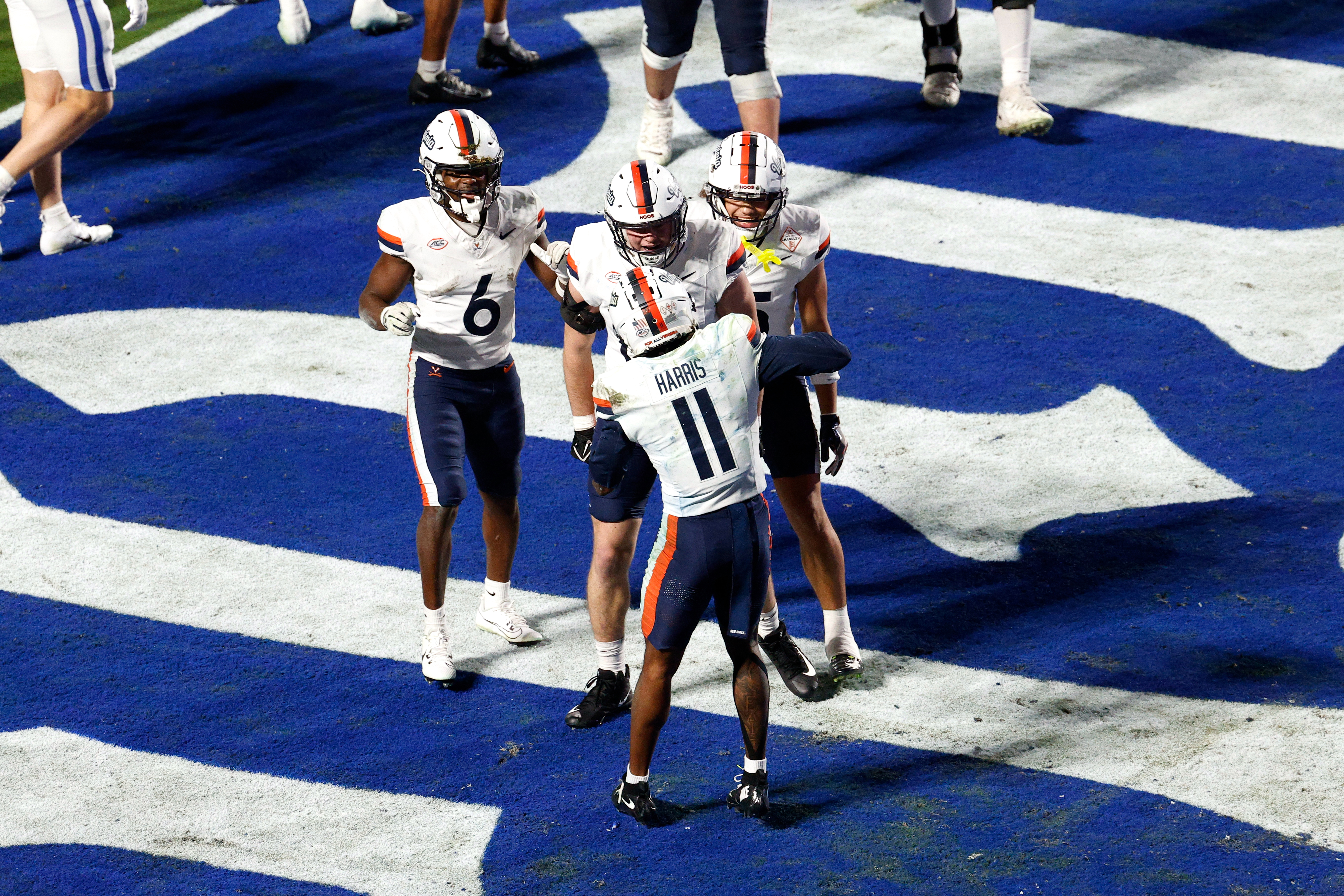 DURHAM, NORTH CAROLINA - NOVEMBER 15: Trell Harris #11 of the Virginia Cavaliers celebrates with teammates following his touchdown in the second half against the Duke Blue Devils at Wallace Wade Stadium on November 15, 2025 in Durham, North Carolina. (Photo by Lance King/Getty Images)