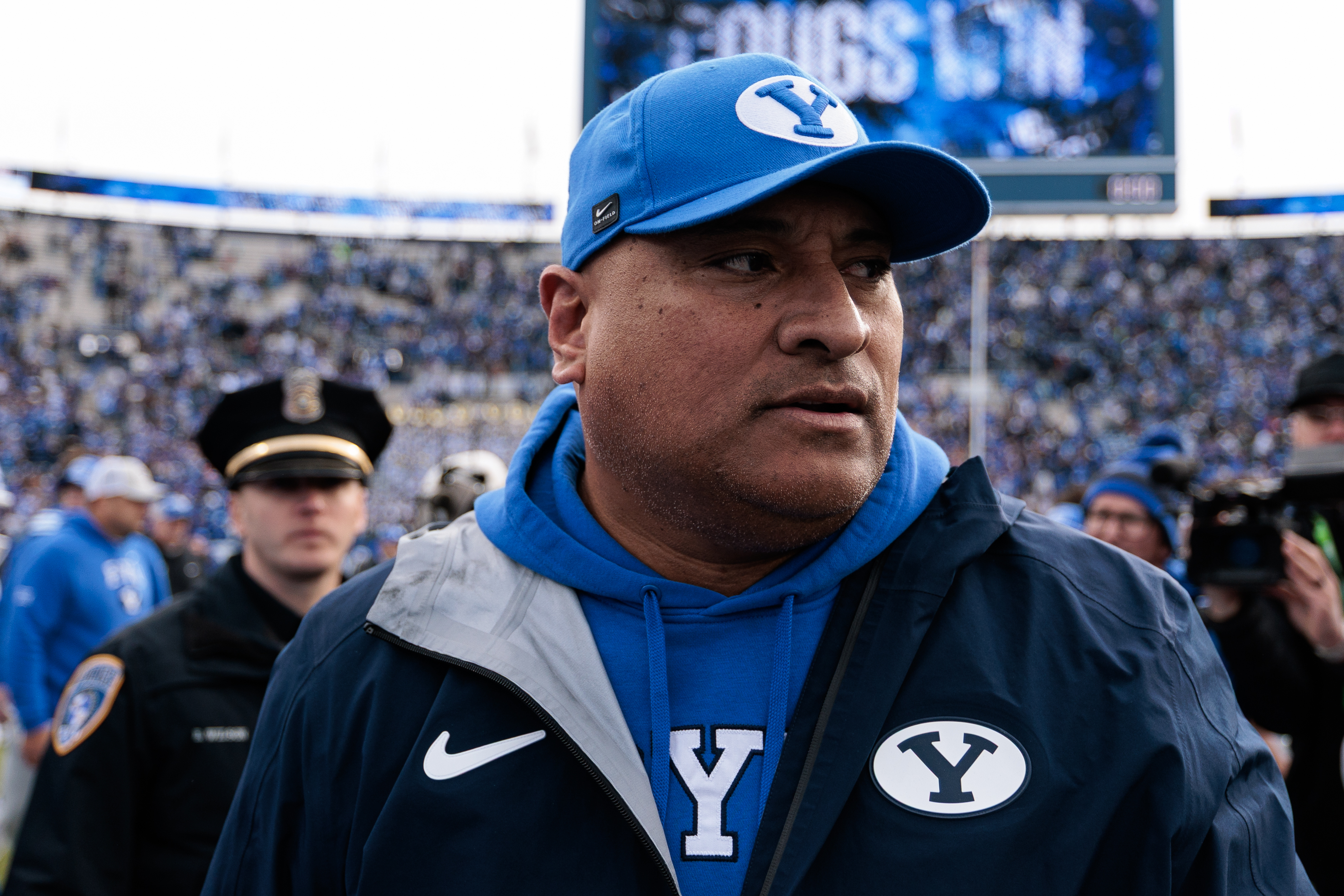 PROVO, UTAH - NOVEMBER 29: Head coach Kalani Sitake of the BYU Cougars walks the field after winning the game against the UCF Knights at LaVell Edwards Stadium on November 29, 2025 in Provo, Utah. (Photo by Andrew Wevers/Getty Images)