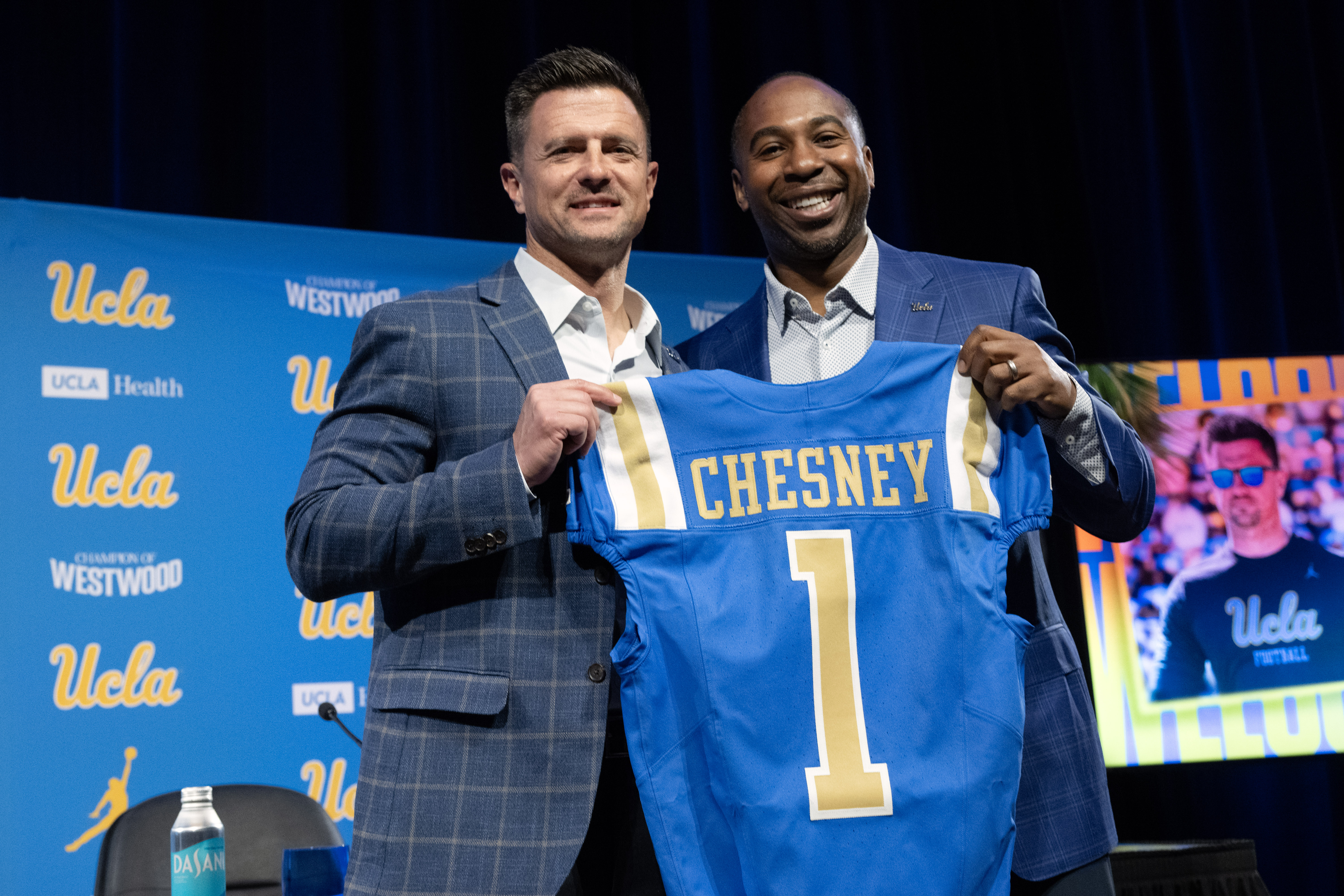 Los Angeles, CA - December 09: New UCLA football head coach Bob Chesney, left, and UCLA Athletic Director Martin Jarmon pose for photos during a ceremony to introduce Chesney at UCLA in Westwood on Tuesday, December 9, 2025. (Photo by Hans Gutknecht/MediaNews Group/Los Angeles Daily News via Getty Images)