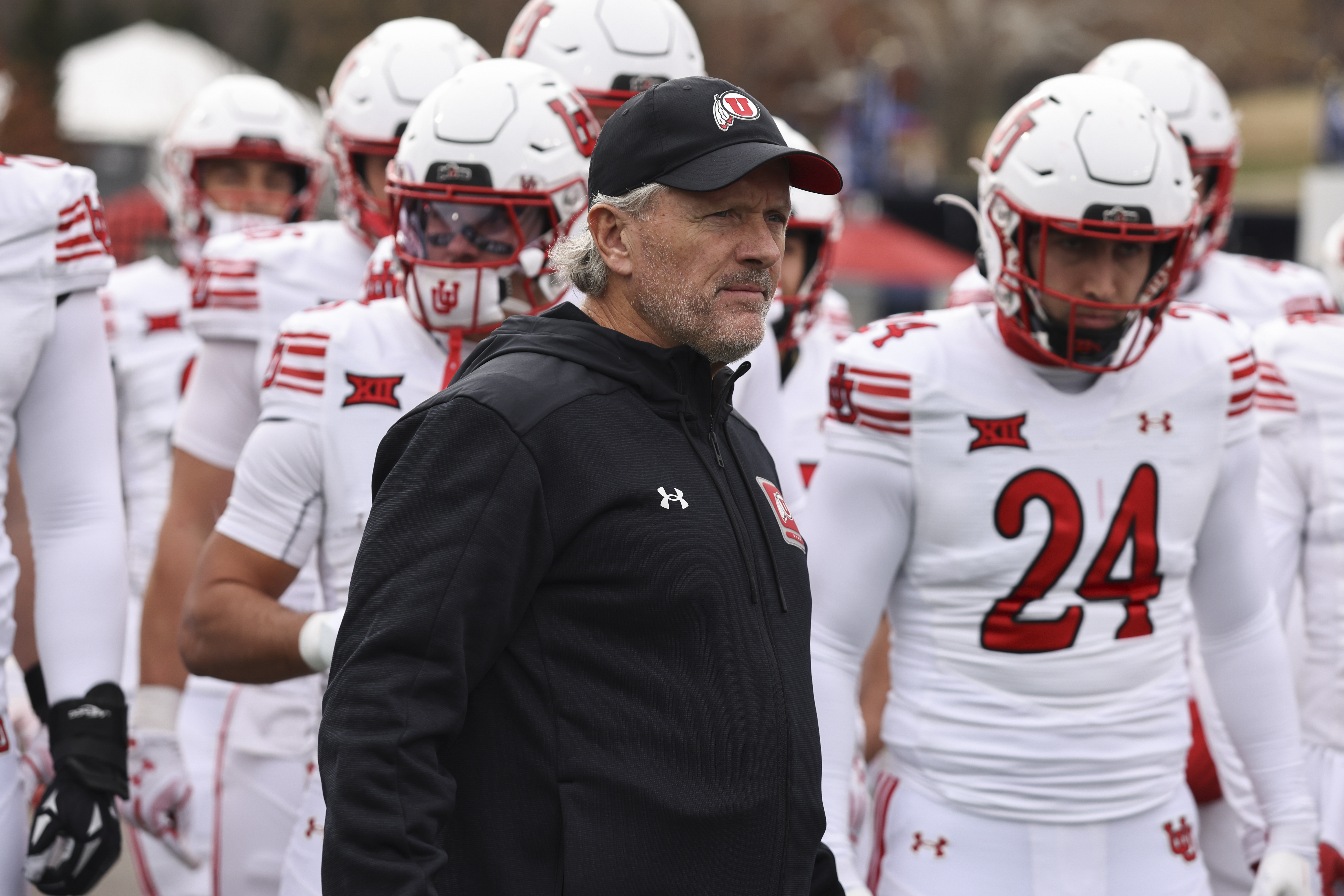 LAWRENCE, KS - NOVEMBER 28: Utah Utes head coach Kyle Whittingham with his team before a Big 12 football game between the Utah Utes and Kansas Jayhawks on November 28, 2025 at David Booth Kansas Memorial Stadium in Lawrence, KS. (Photo by Scott Winters/Icon Sportswire via Getty Images)
