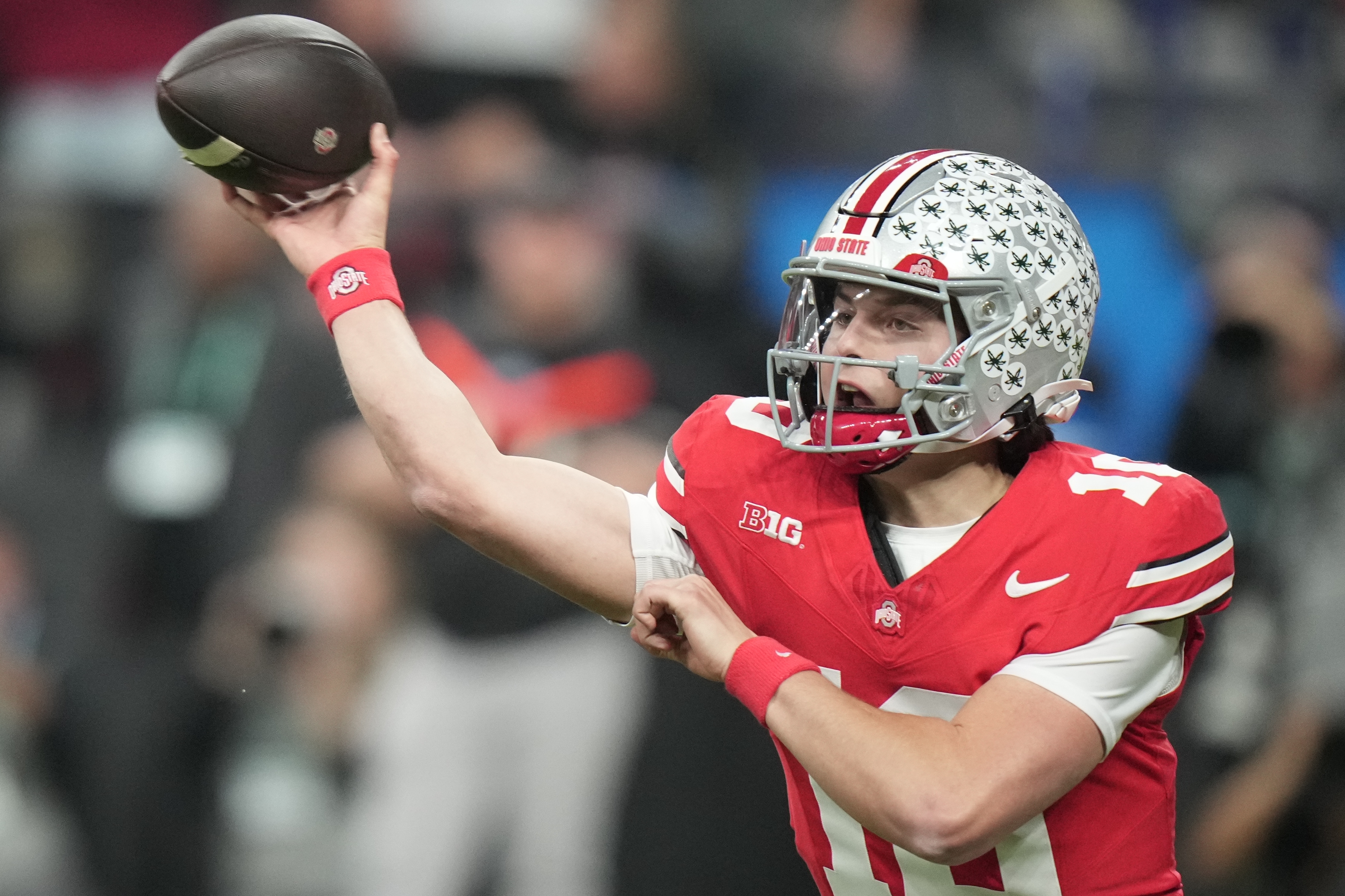 Ohio State's Julian Sayin throws during the first half of the Big Ten championship NCAA college football game against Indiana in Indianapolis, Saturday, Dec. 6, 2025. (AP Photo/AJ Mast)