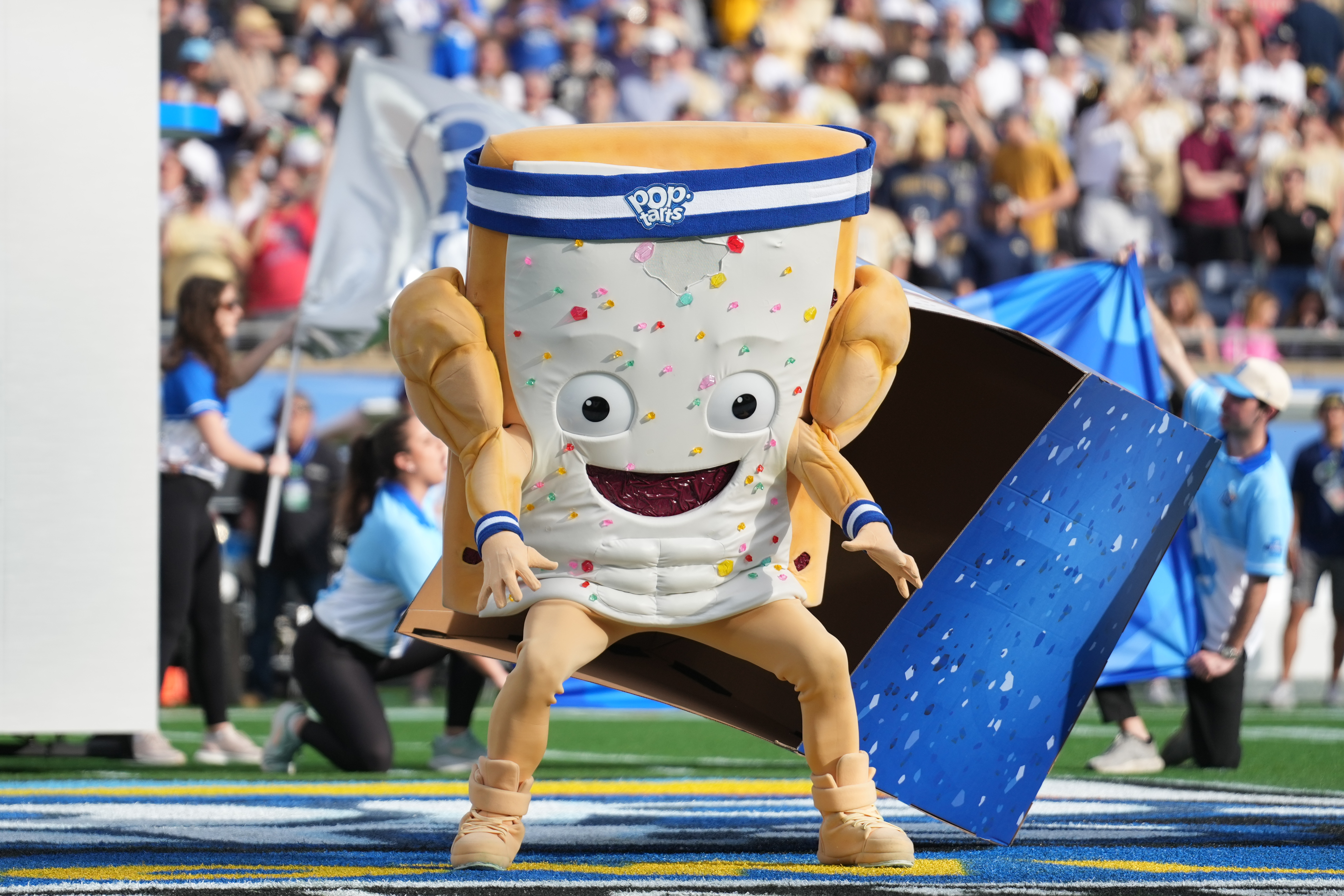 ORLANDO , FL - DECEMBER 27: Pop-Tarts mascots perform for fans before the Pop-Tarts Bowl between BYU Cougars and the and the Georgia Tech Yellow Jackets on Saturday, December 27, 2025 at Camping World Stadium in Orlando, FL. (Photo by Peter Joneleit/Icon Sportswire via Getty Images)