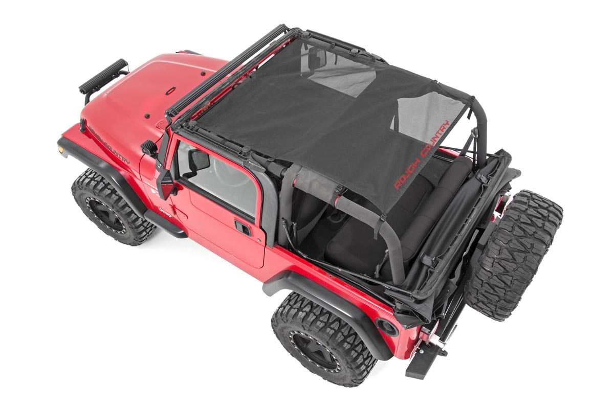 https://ewr1.vultrobjects.com/sema-data-images/DHTP/97-06_tj_full_black_mesh_top_installed_-_85106_1.jpg