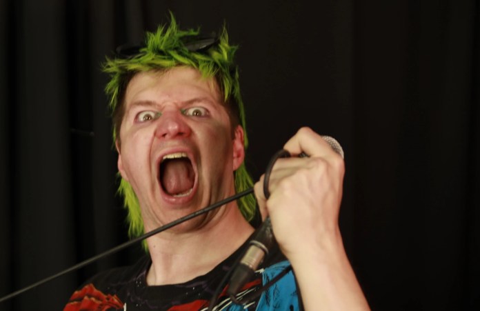 How The Funeral Portrait’s Lee Jennings Learned to Sing – From Musical Theatre + Electronic Grindcore to Today