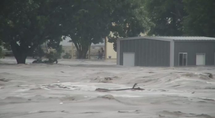 At least 13 dead in Texas floods and more than 20 children missing from a girls summer camp