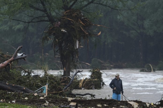 At least 32 people are dead in Texas floods as the search continues for people still missing