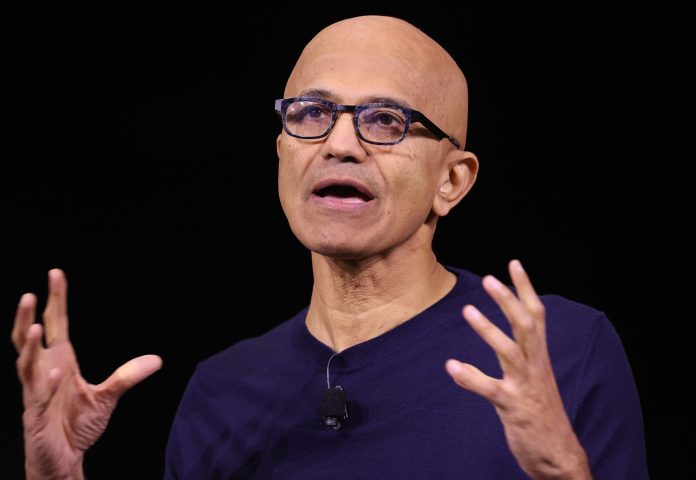 Satya Nadella on the ‘enigma of success’ in the age of AI: a thriving business, but 15,000+ layoffs