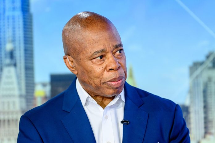 NYC Mayor Eric Adams’ ex-aide handed a reporter a potato chip bag stuffed with cash