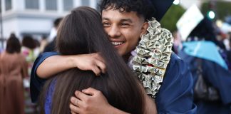 Every year, a billionaire CEO doles out $1,000 checks to local college grads—with a catch: They have to give half the money to charity | Fortune