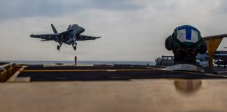 Carrier strike group with stealth fighters arrives in Mideast as Trump weighs Iran attack while Air Force jets and cargo planes also head to region | Fortune