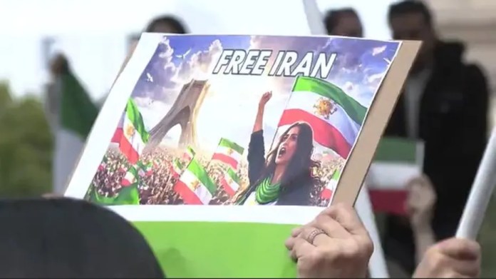 Austin protesters at State Capitol call on President Trump to “Help Iran” Austin protesters at State Capitol call on President Trump to “Help Iran”