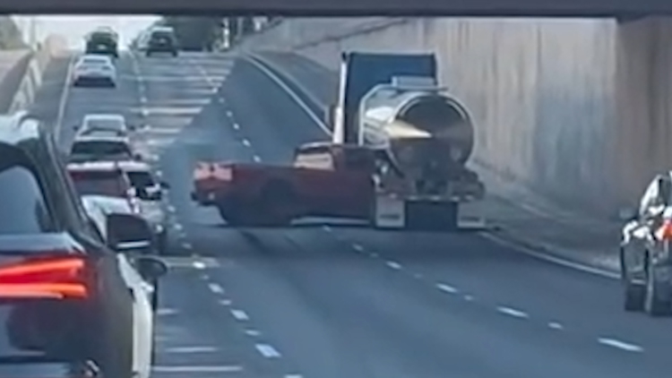 Truck pinned under 18-wheeler in crash that shut down southbound lanes on the Dallas North Tollway Truck pinned under 18-wheeler in crash that shut down southbound lanes on the Dallas North Tollway