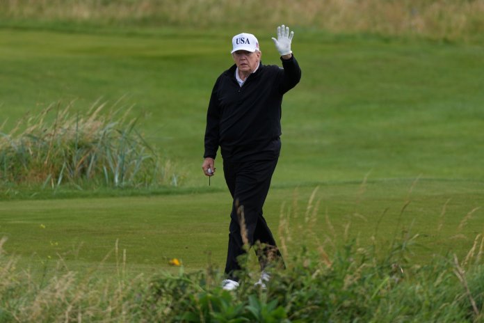 Trump plays golf in Scotland while protesters take to the streets and decry his visit