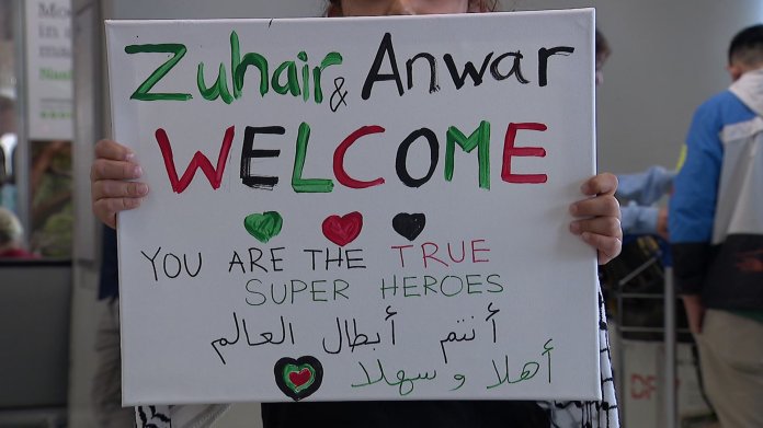 Crowd welcomes children from Gaza at DFW airport
