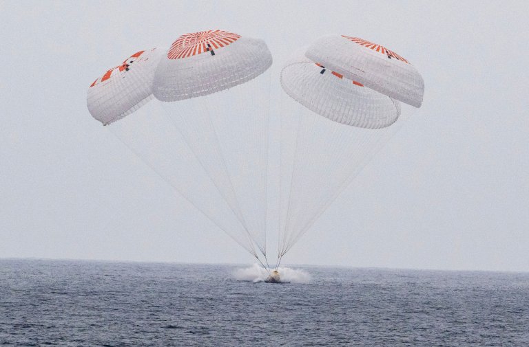 Astronauts return to Earth with SpaceX after 5 months at the International Space Station Astronauts return to Earth with SpaceX after 5 months at the International Space Station