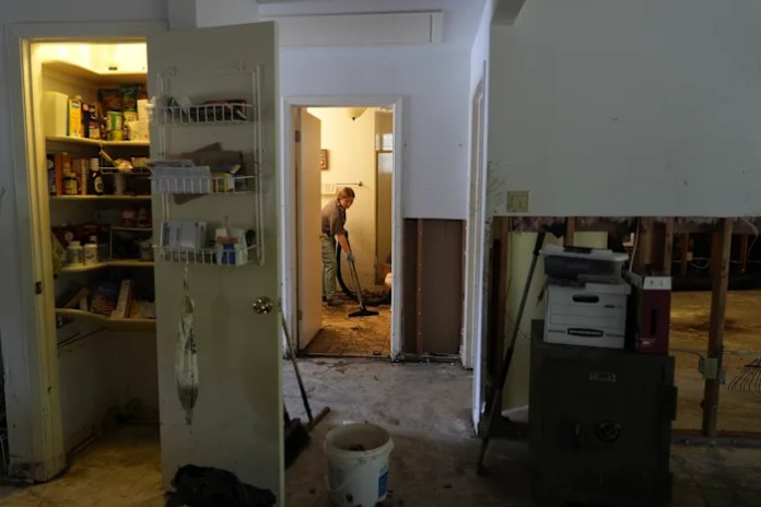 Searchers in helicopters and on horseback scour Texas flood debris for the missing