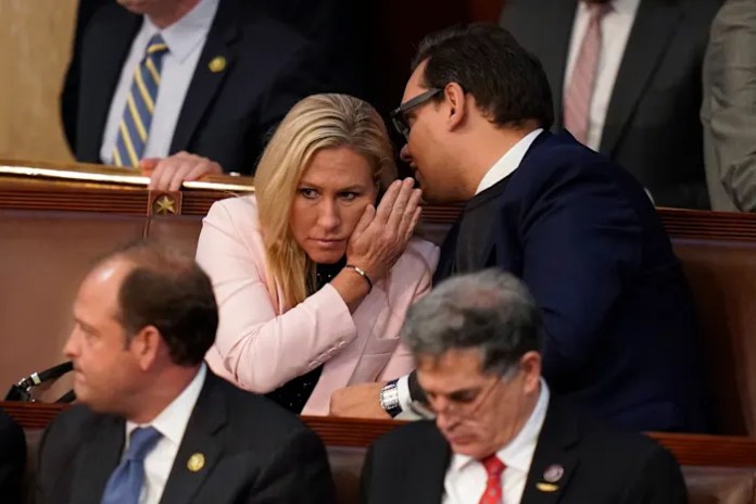 Marjorie Taylor Greene calls for George Santos’ 7-year sentence to be commuted