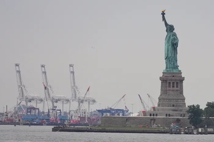 The Latest: US import taxes hit levels not seen in nearly 100 years The Latest: US import taxes hit levels not seen in nearly 100 years