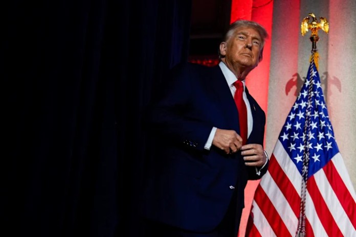 The Latest: Trump to visit Federal Reserve as feud with its chair continues