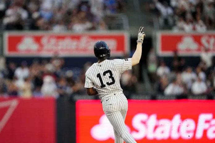Chisholm homers twice and Schlittler wins MLB debut as Yankees top Mariners 9-6