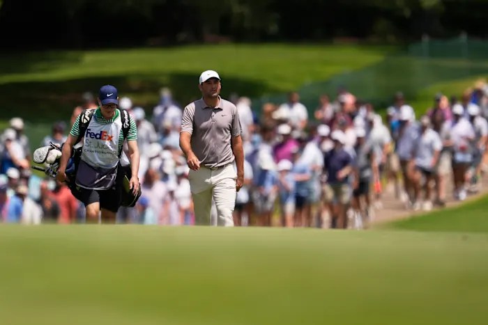 Scheffler turns to fill-in when caddie Ted Scott leaves for family emergency Scheffler turns to fill-in when caddie Ted Scott leaves for family emergency