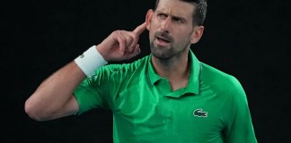 Novak Djokovic advances to Australian Open quarterfinals on a walkover after Jakub Mensik withdraws
