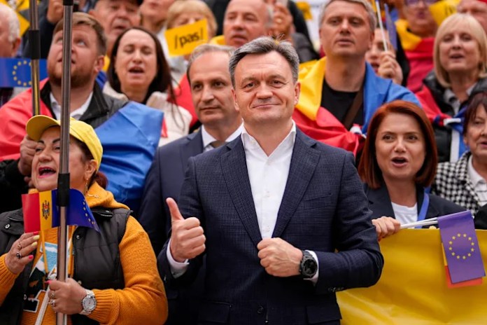 Moldovans vote in a tense election plagued by Russian interference claims