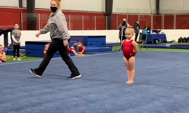 Inspirational Heartland Gymnastics coach and gymnast duo Inspirational Heartland Gymnastics coach and gymnast duo