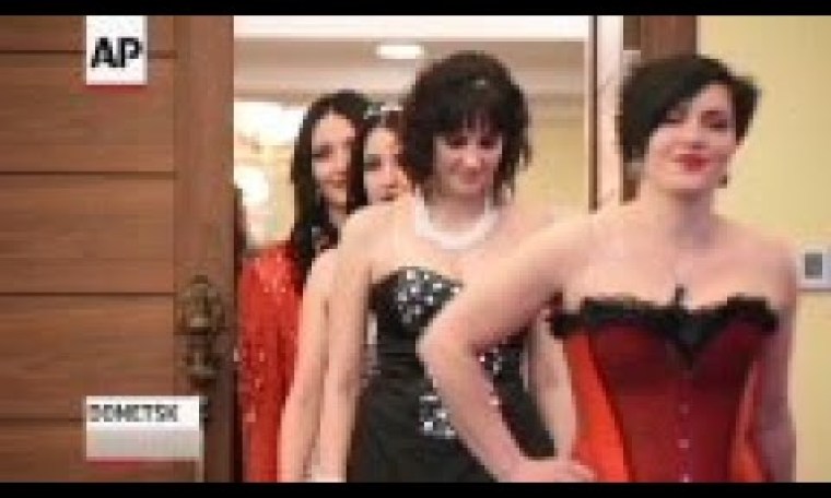 Female rebel fighters participated in a beauty pageant on Saturday in the rebel-held city of Donetsk Female rebel fighters participated in a beauty pageant on Saturday in the rebel-held city of Donetsk