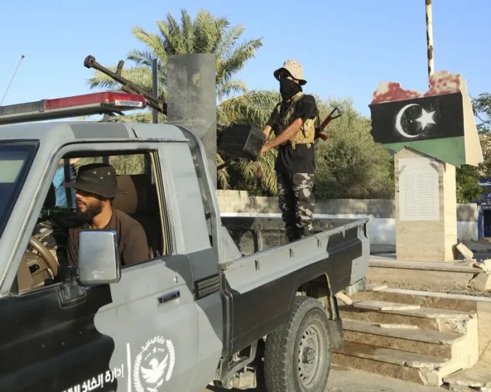 Photo credit: www.theguardian.com Security Vehicles Overturn in Libya, Injuring Officers on Official Mission – Libya 24