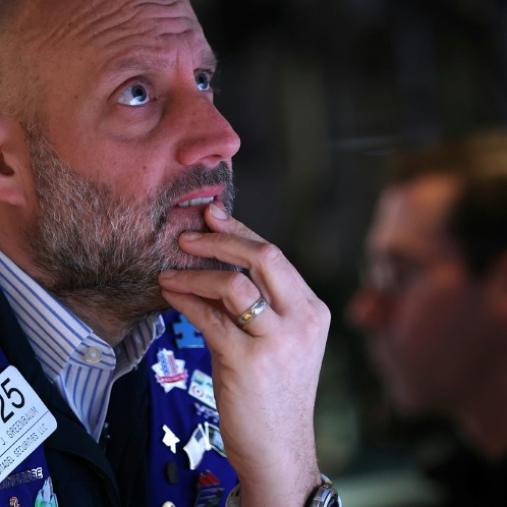 Wall Street salue le revers sur les droits de douane, sans jubiler Wall Street salue le revers sur les droits de douane, sans jubiler