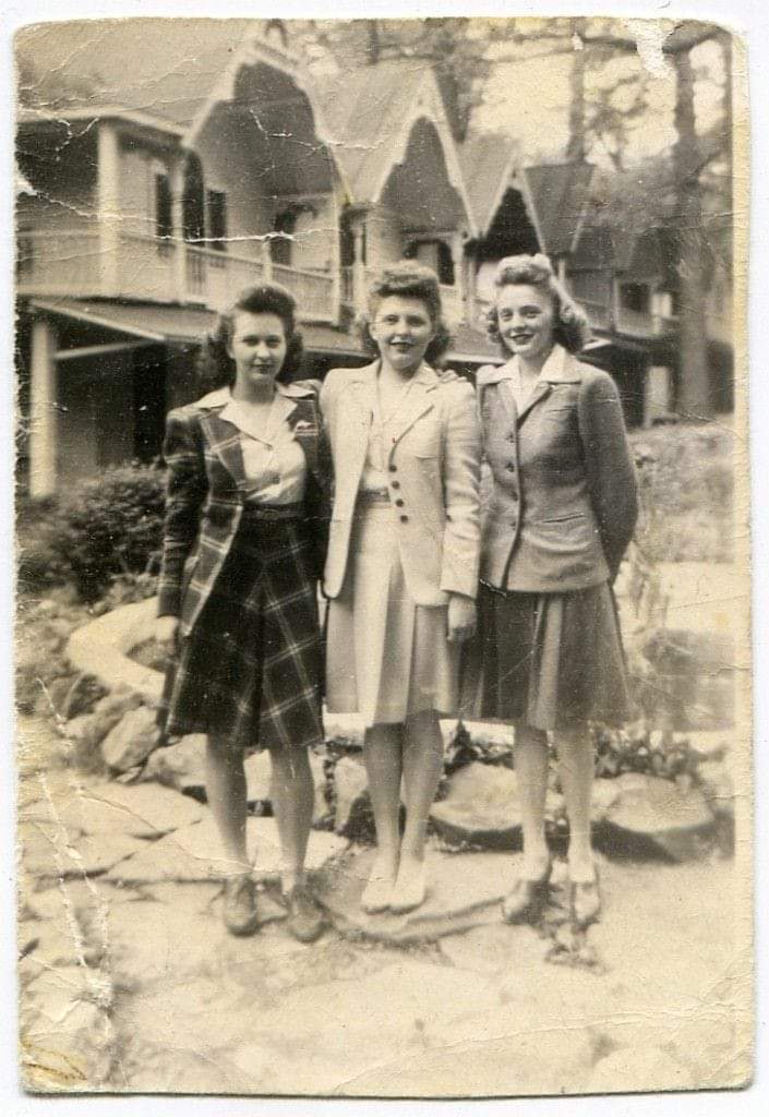 Women in front of water fountain Women in front of water fountain
