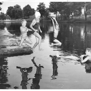 Lake with kids jumping in Lake with kids jumping in