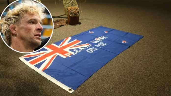 Man Charged Over Theft of Artist’s ‘Please Walk on Me’ Flag Man Charged Over Theft of Artist’s ‘Please Walk on Me’ Flag