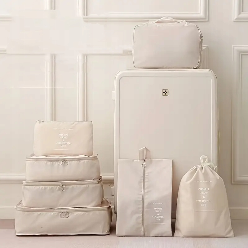 KOMPRESINĖS KELIONĖS ORGANIZATORIUS KELIONINIŲ LAGAMINŲ MAŠINIŲ PAKUMUI 7 Vnt.