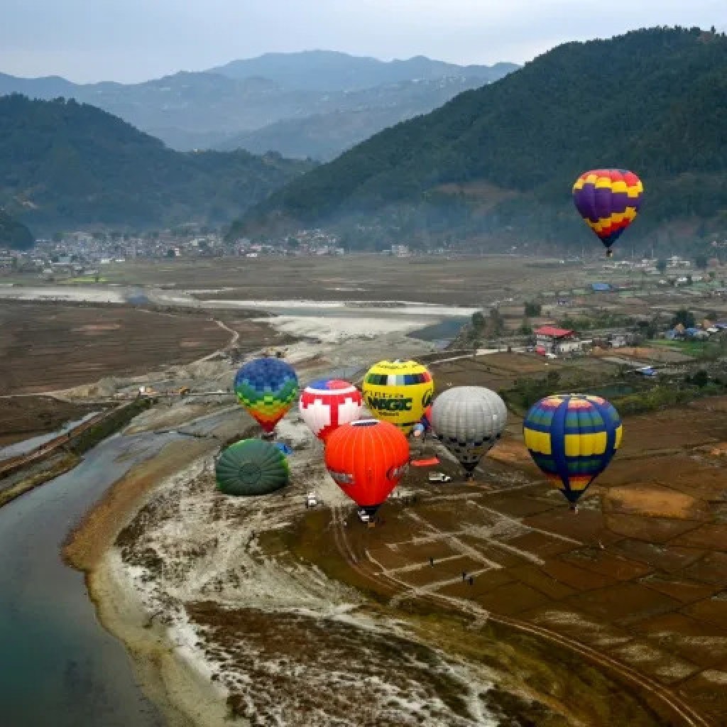 Hot air balloons rise in the sky during the International Hot-Air Balloon festival in Pokhara (PRAKASH MATHEMA) Hot air balloons rise in the sky during the International Hot-Air Balloon festival in Pokhara (PRAKASH MATHEMA)
