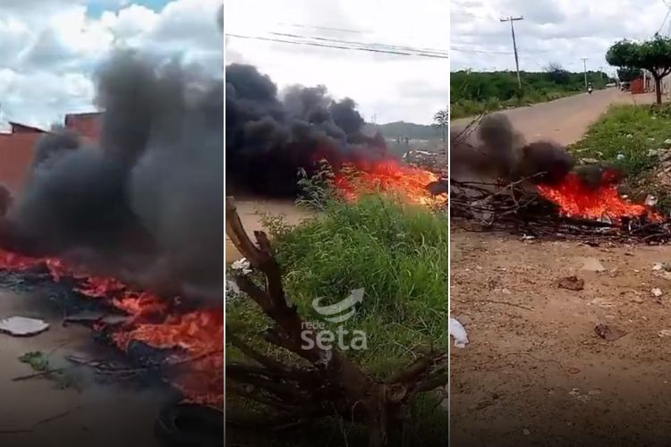 Moradores queimam pneus e bloqueiam via durante protesto por melhorias no bairro Água Bela, em Juazeiro, BA: Moradores queimam pneus e bloqueiam via durante protesto por melhorias no bairro Água Bela, em Juazeiro, BA: