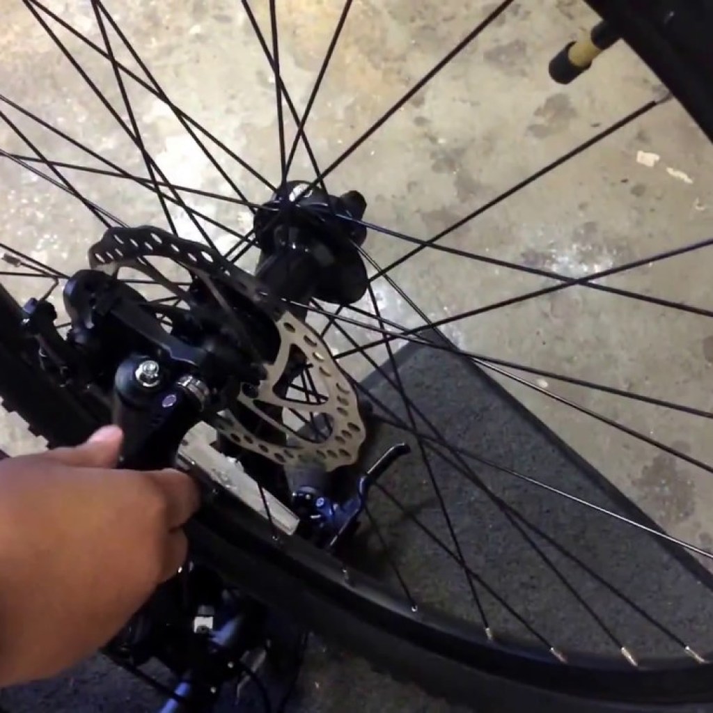 How to Remove a Front Wheel on a Bike with Disc Brakes How to Remove a Front Wheel on a Bike with Disc Brakes