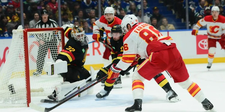Canucks Lose to Flames 5-2, Extend Losing Streak to Three Games Canucks Lose to Flames 5-2, Extend Losing Streak to Three Games
