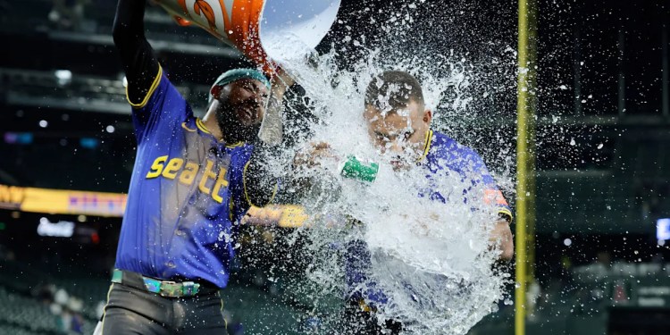 Mariners seize first-place tie in AL West on 12th-inning walk-off by rookie Harry Ford Mariners seize first-place tie in AL West on 12th-inning walk-off by rookie Harry Ford