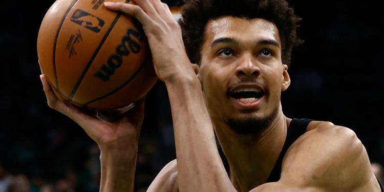 Victor Wembanyama rookie card sets auction record price despite news of season-ending injury Victor Wembanyama rookie card sets auction record price despite news of season-ending injury