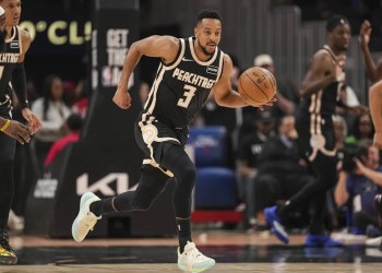 Hawks secure playoff spot with 124-102 victory Hawks secure playoff spot with 124-102 victory