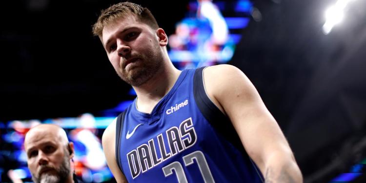 Mavericks star Luka Dončić out at least a month with left calf strain Mavericks star Luka Dončić out at least a month with left calf strain
