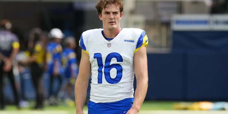 K Joshua Karty and DL P.J. Mustipher sign tenders K Joshua Karty and DL P.J. Mustipher sign tenders