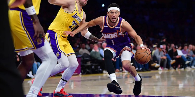 Devin Booker exits game against Lakers due to groin injury Devin Booker exits game against Lakers due to groin injury